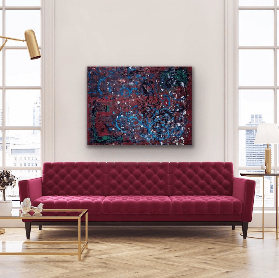 Incoherent Dimensionality in Development installed above a burgundy tufted sofa in a styled room.